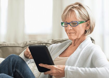 Woman reading on tablet